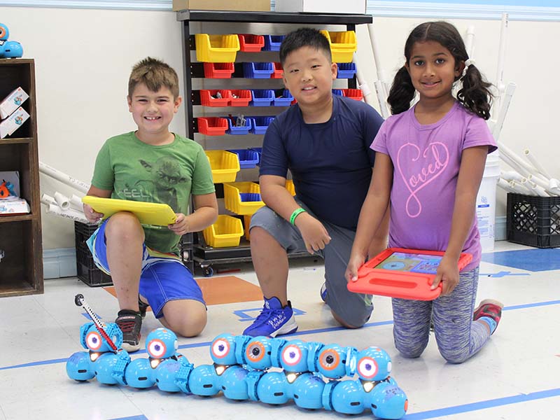 science campers with dash robots